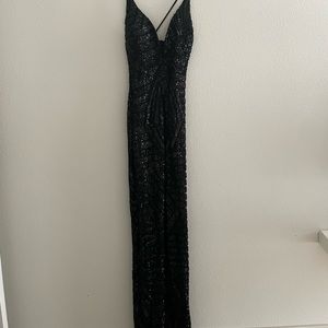 Glam dress From Bloomingdale’s 
Worn once Mini V cut front 
Exposed low cut back